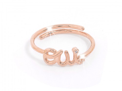 anello in argento color rosa con la scritta OUI, SI e punto luce